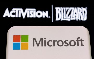 FILE PHOTO: Microsoft logo is seen on a smartphone placed on displayed Activision Blizzard logo in this illustration taken January 18, 2022. REUTERS/Dado Ruvic/Illustration/File Photo/File Photo